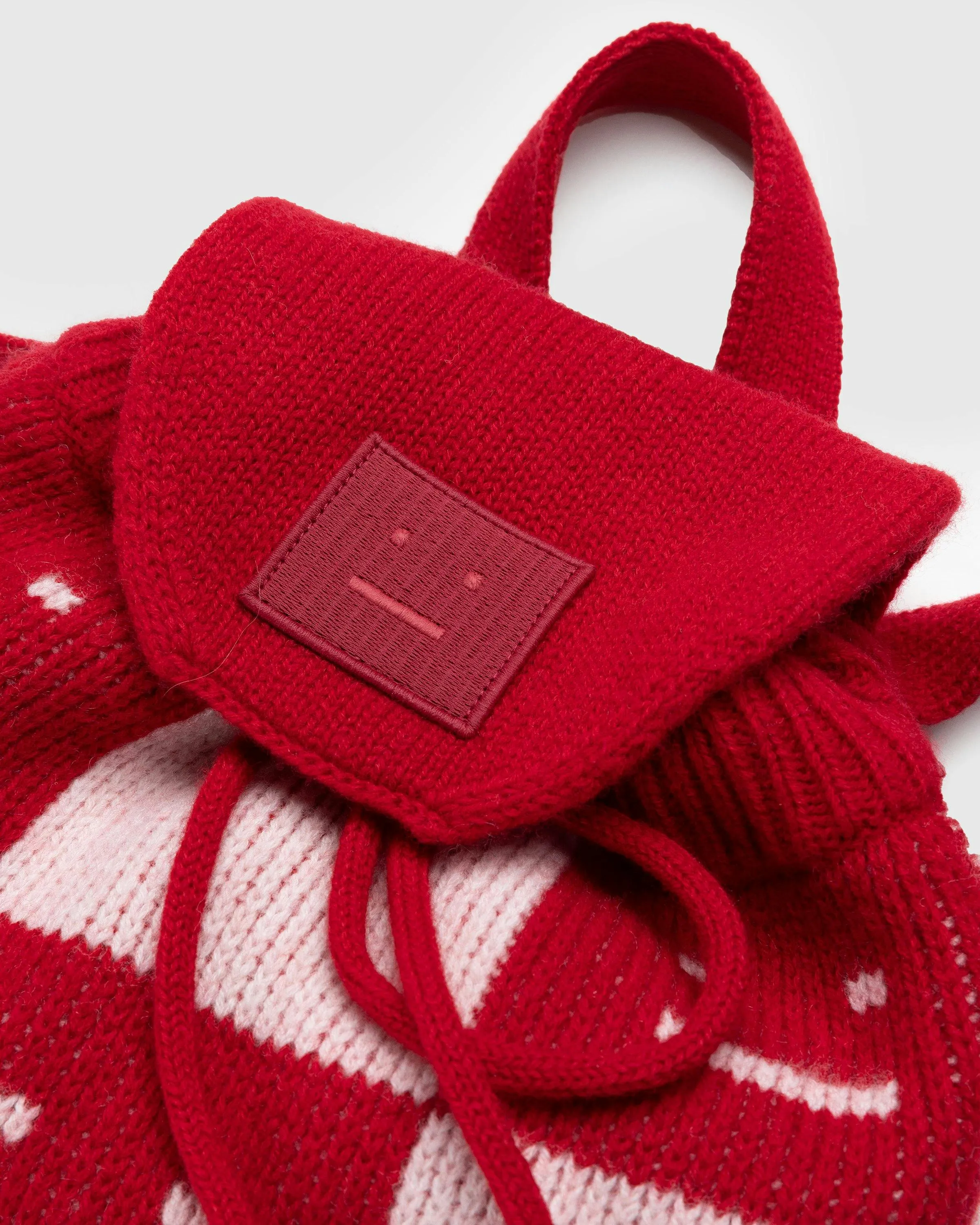 Acne Studios – Knit Face Backpack Deep Red/Faded Pink/Melange | Highsnobiety Shop