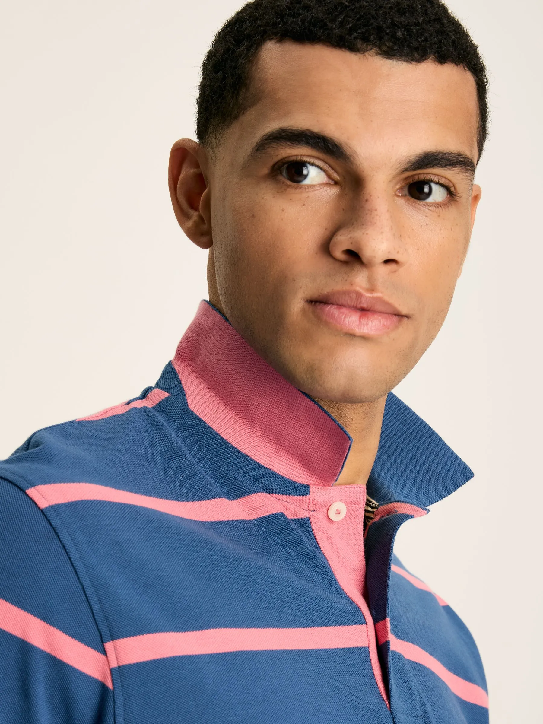 Blue/Pink Striped Polo Shirt