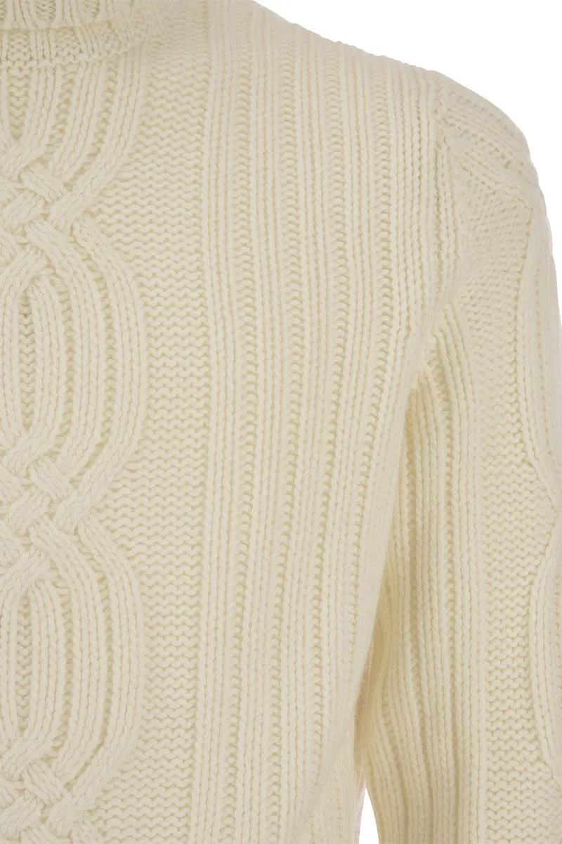BRAIDED CASHMERE TURTLENECK SWEATER