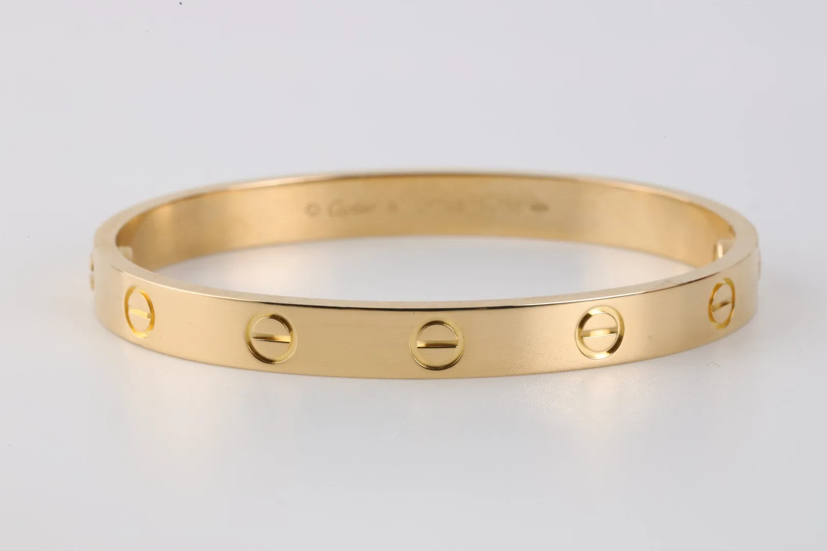 Cartier 18k Yellow Gold Love Bracelet Size 16 (30.53g.)