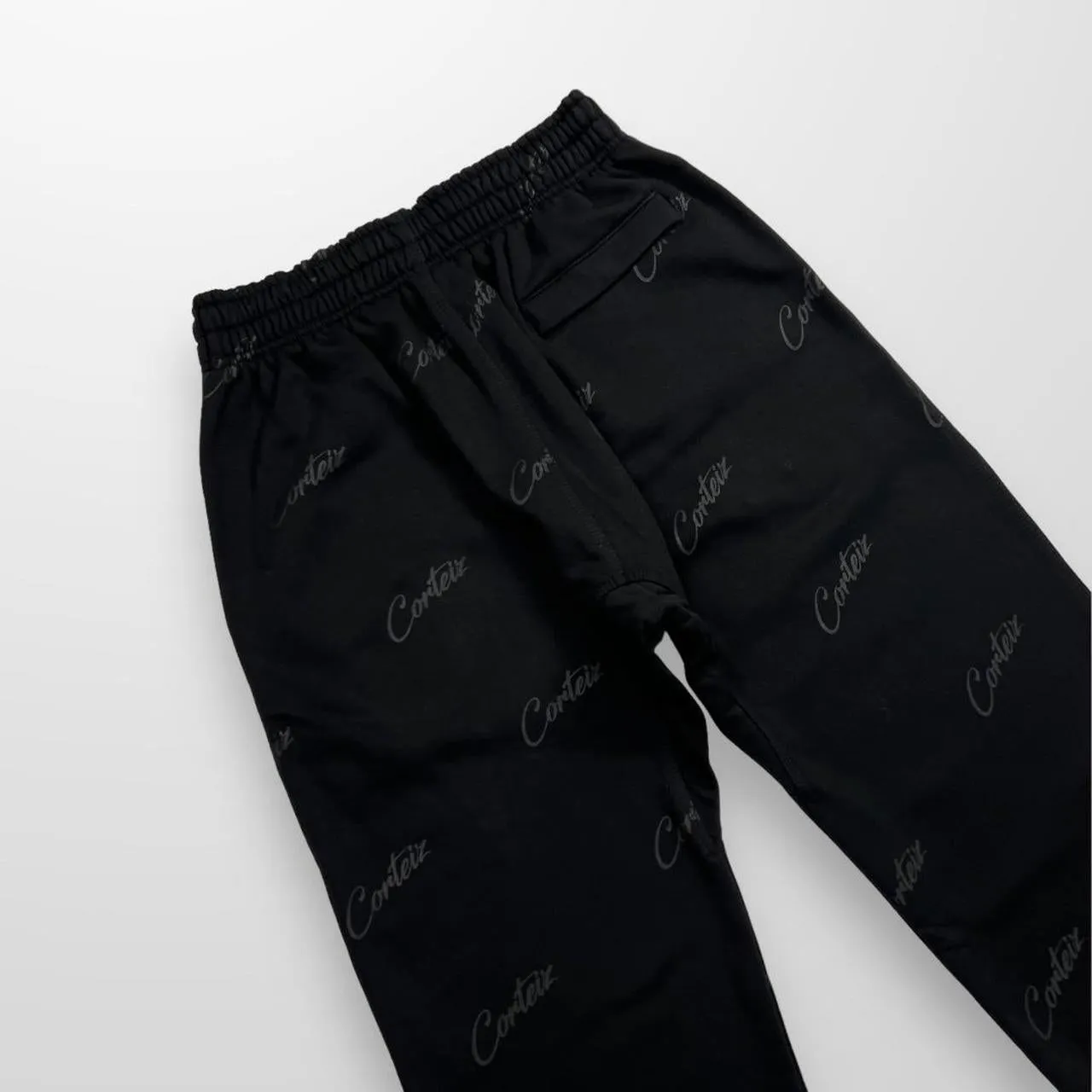 Corteiz Script / All Over Print Joggers In Triple Black