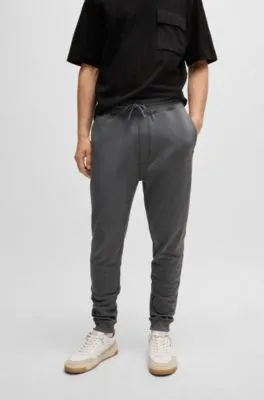 Cotton-terry tracksuit bottoms with logo patch