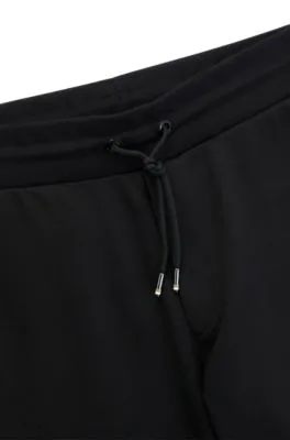 Cotton-terry tracksuit bottoms with printed logo