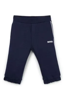 Kids' tracksuit bottoms with logo print
