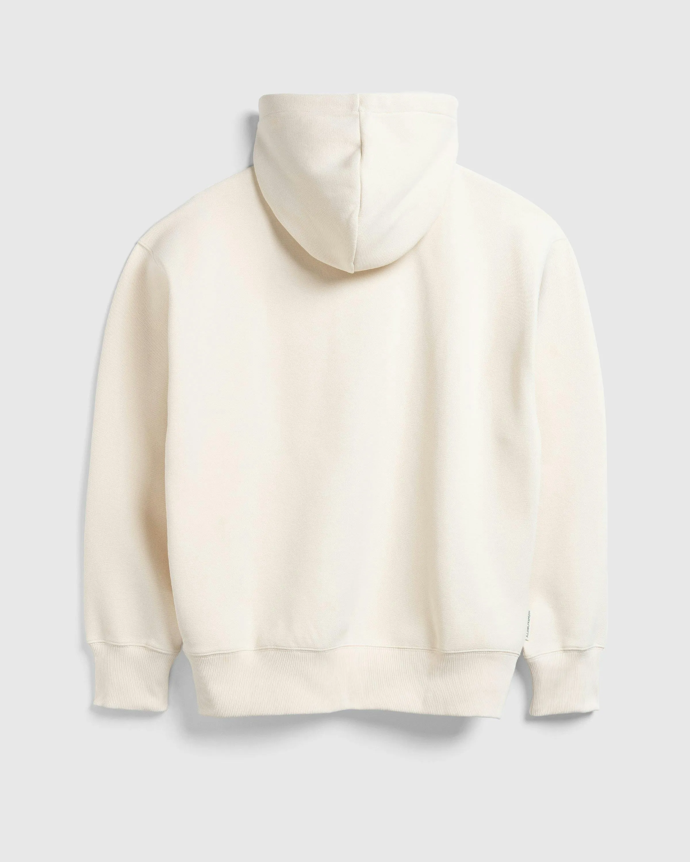 Lacoste x Highsnobiety – Double-Faced Piqué Hoodie Eggshell  | Highsnobiety Shop