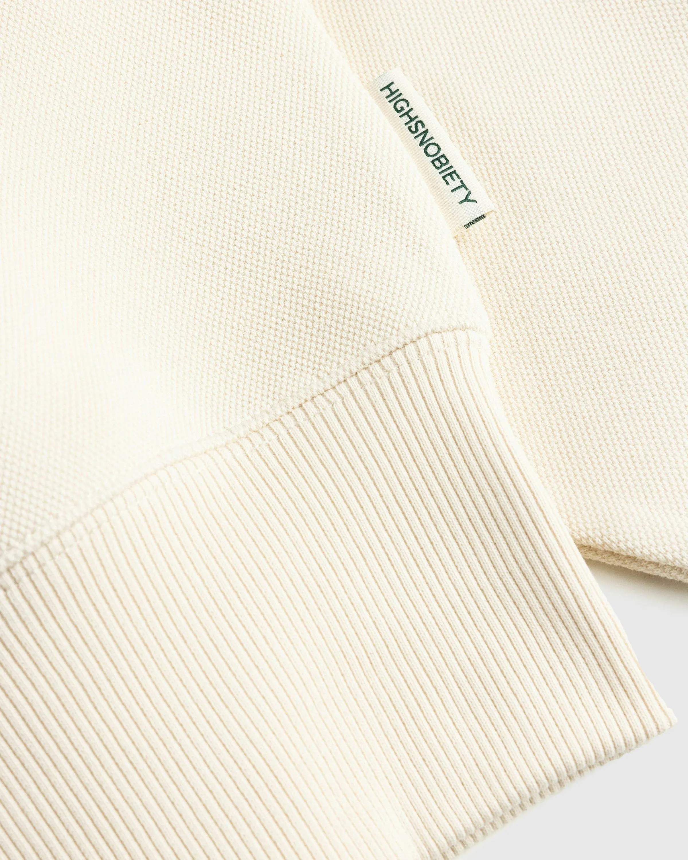 Lacoste x Highsnobiety – Double-Faced Piqué Hoodie Eggshell  | Highsnobiety Shop