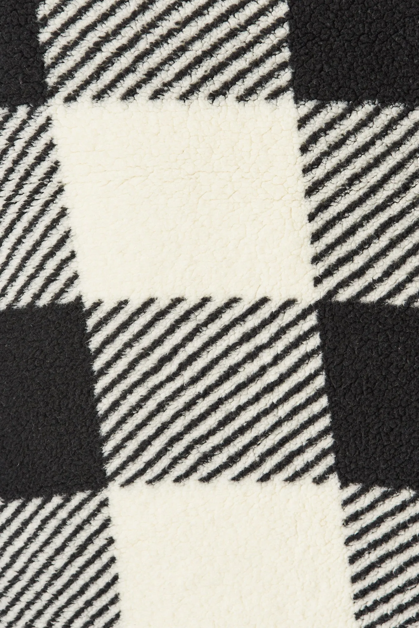 Linea Fluffy Jacket In Black With Beige Check