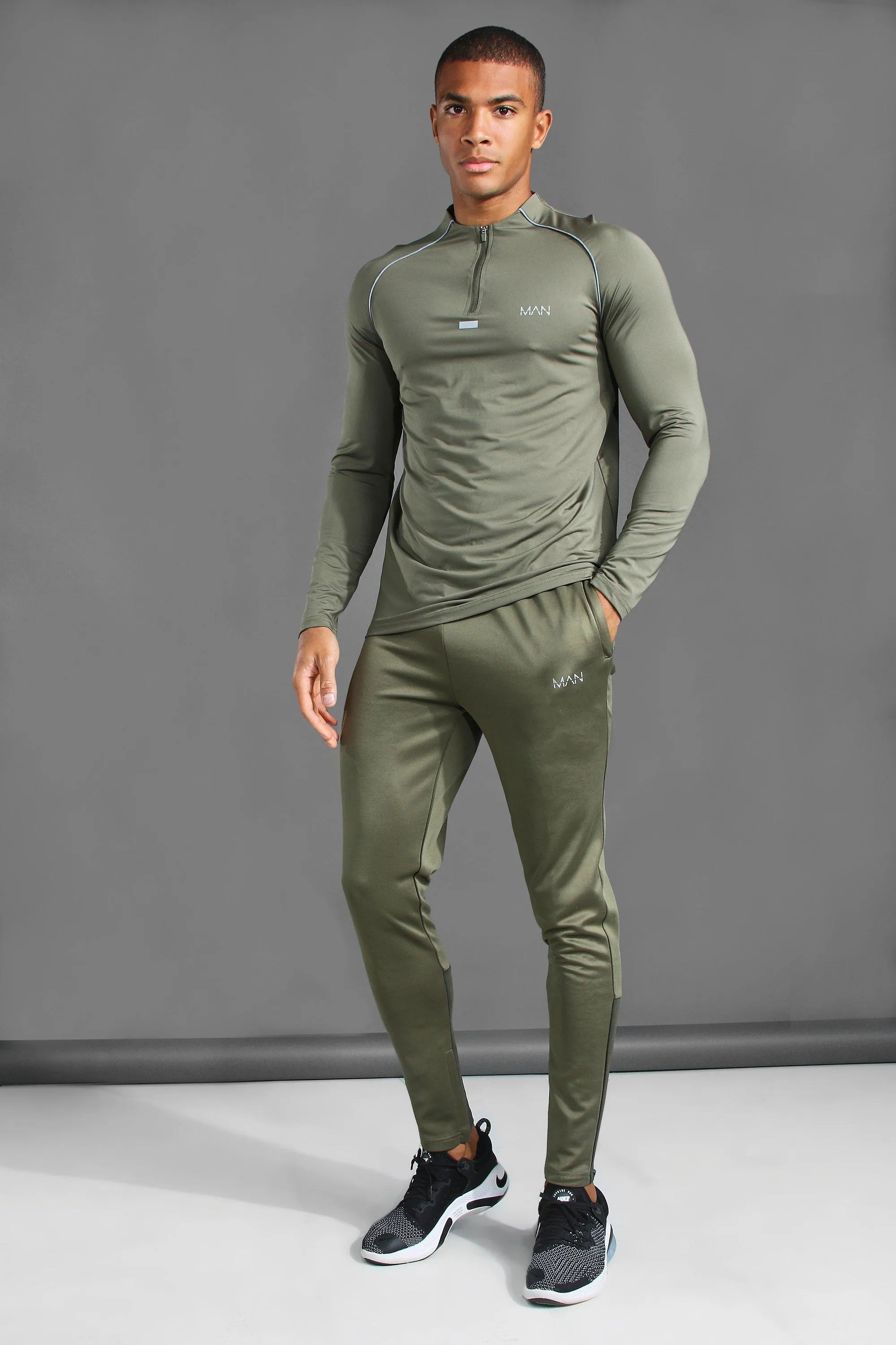 Man Active Gym 1/4 Zip Funnel Neck Tracksuit | boohooMAN UK