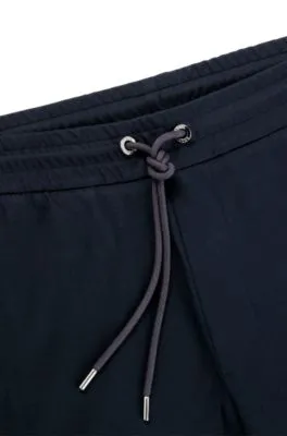 Mercerized-cotton tracksuit bottoms with insert details