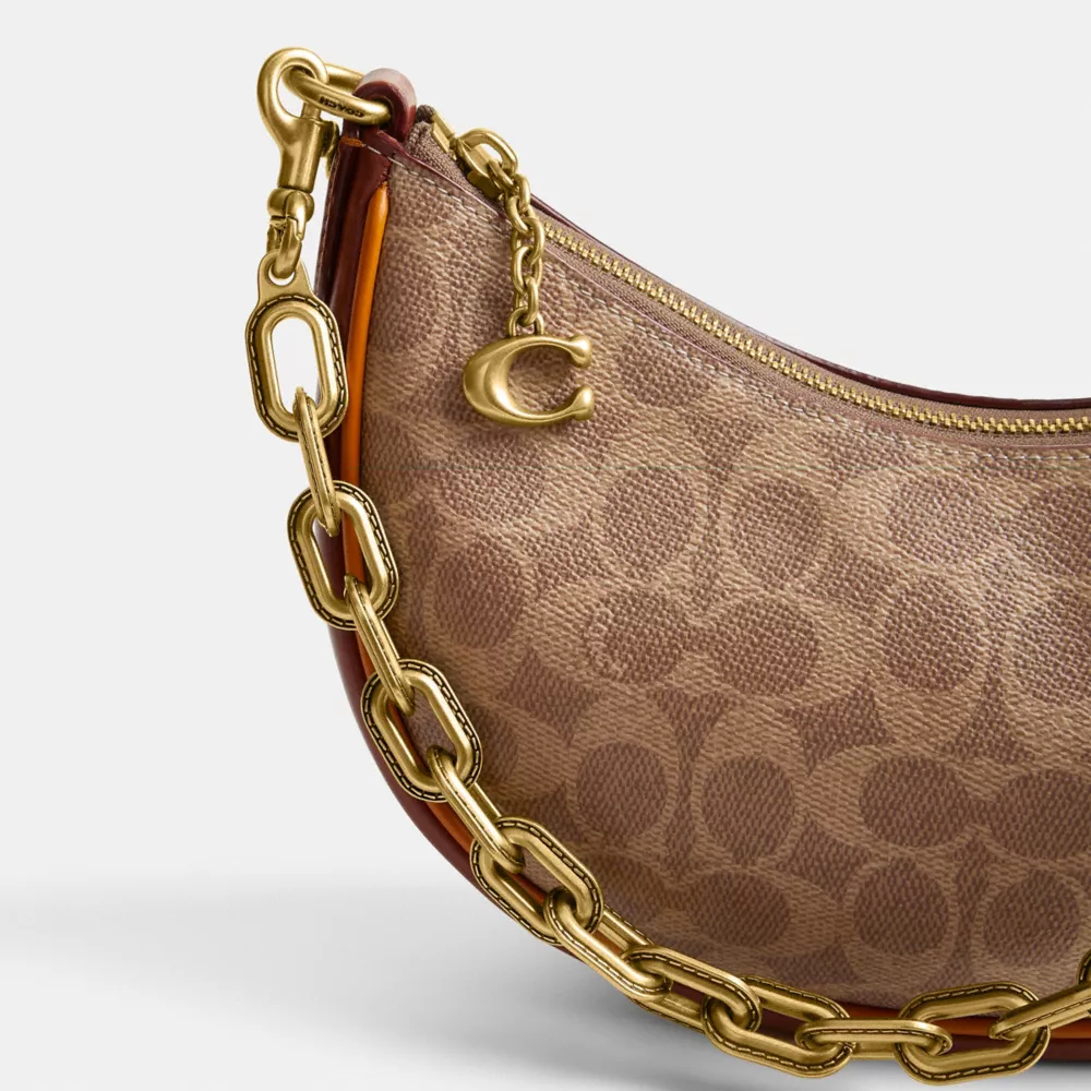 MIRA SHOULDER BAG IN SIGNATURE CANVAS