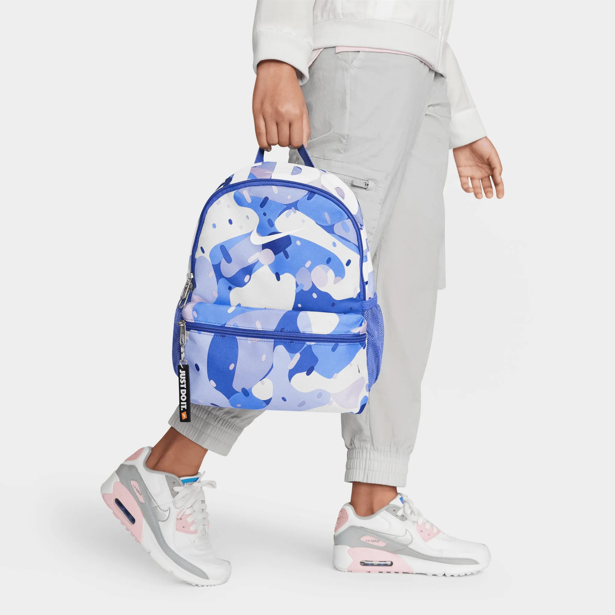 Nike Kids’ Brasilia JDI Printed Mini Backpack Comet Blue / Light Thistle - White