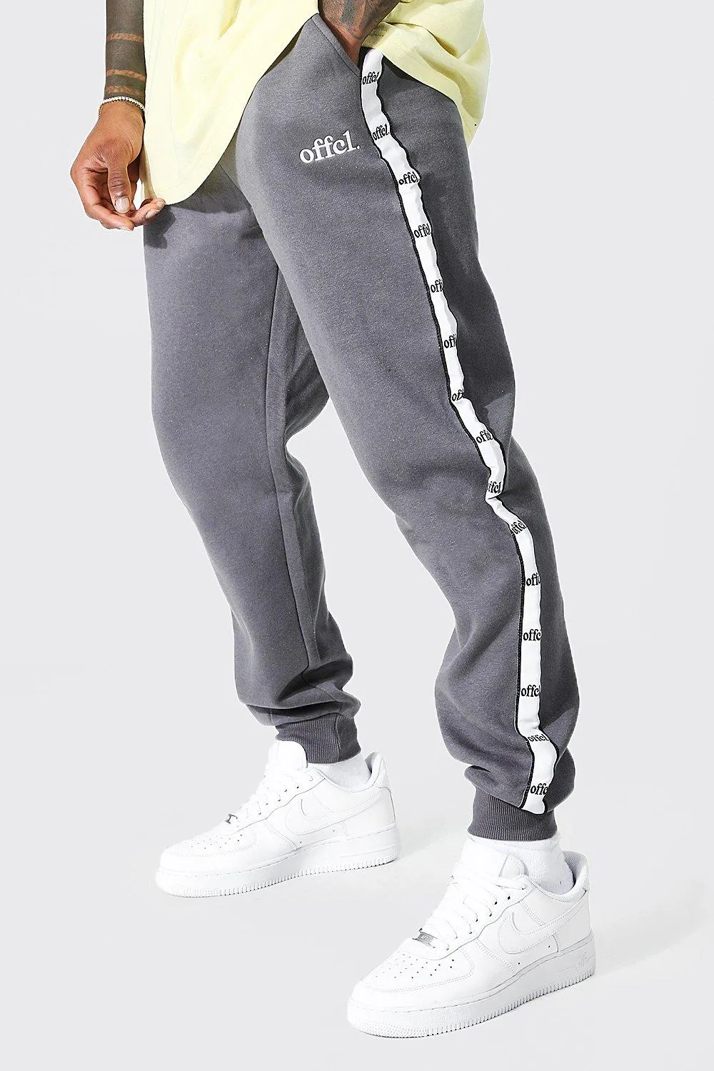 Regular Fit Joggers With Offcl Side Tape | boohooMAN UK