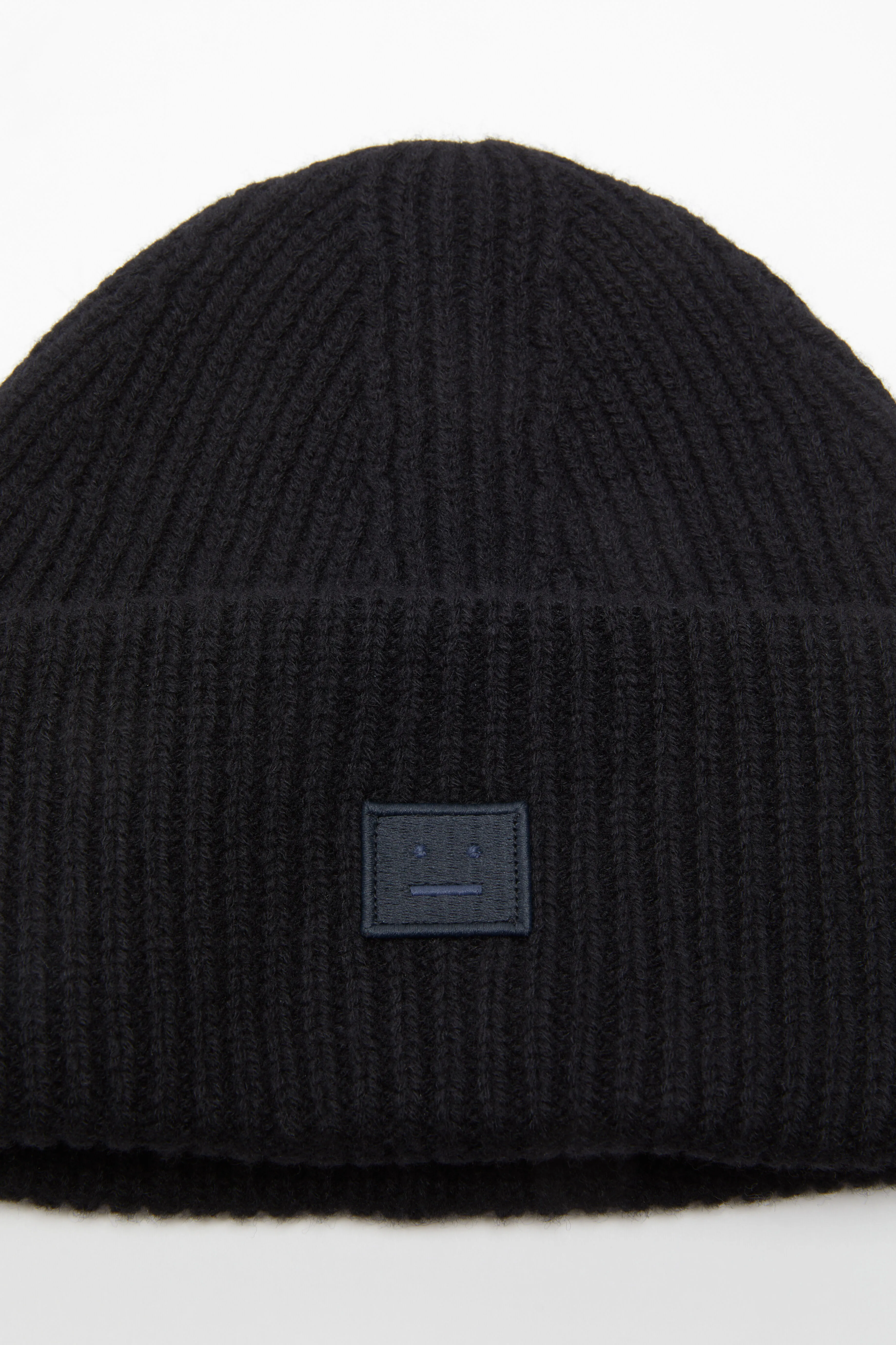 Small face logo beanie