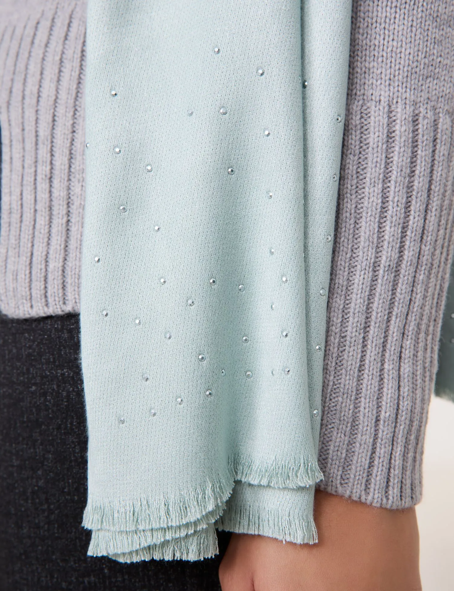 Soft scarf with decorative gemstones