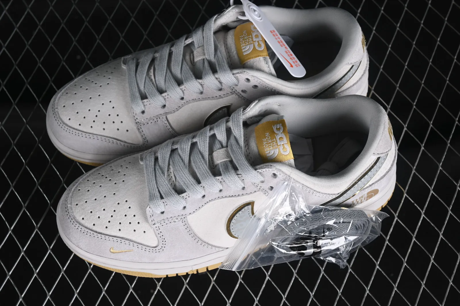 The North Face x CDG x Nike SB Dunk Low Grey Gold DQ1098-337