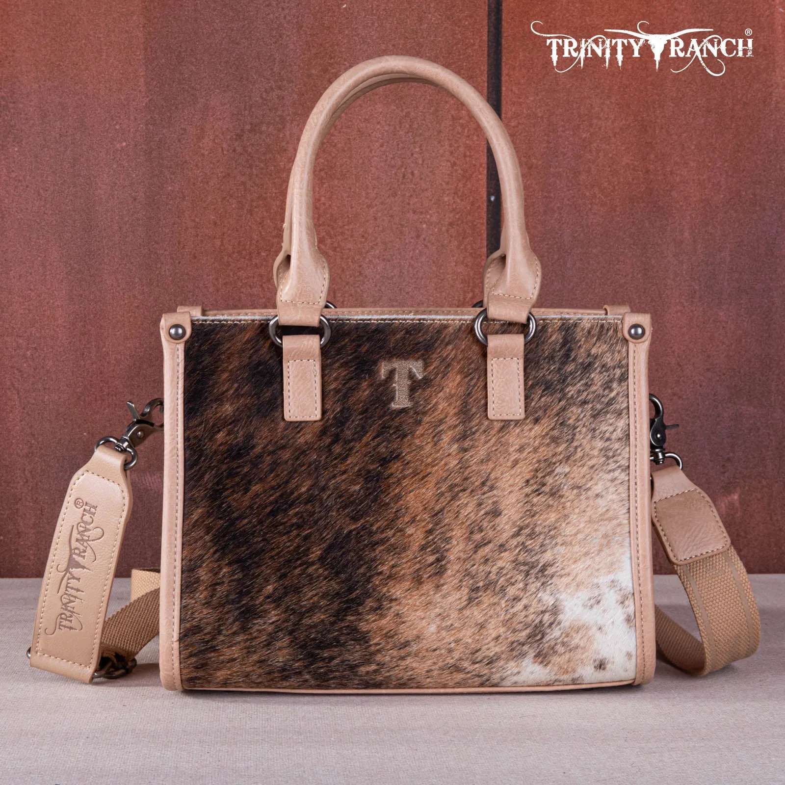 TR164-8250A  Trinity Ranch Hair On Cowhide Tooling Concealed Carry Tote/Crossbody