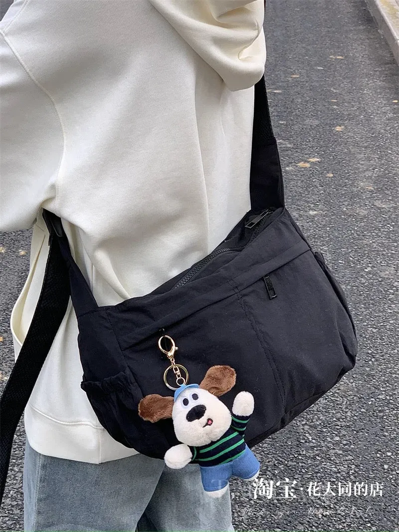 Waterproof nylon dumpling bag for men and women, cross-body bag, simple sports and leisure large capacity shoulder tote bag tren